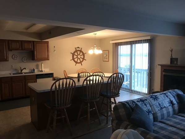 Smart TV, fireplace, books, printers