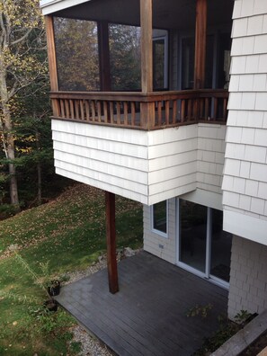 Screened in porch and lower patio