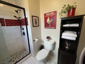 Bathtub, hair dryer, towels, soap