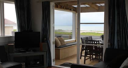 Sea Urchin Cottage offers a tranquil and picturesque escape from the city.