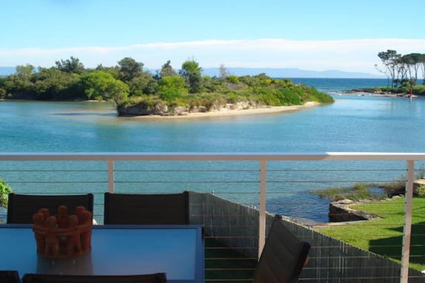view from the uptsairs deck, the estuary flowing to the ocean
