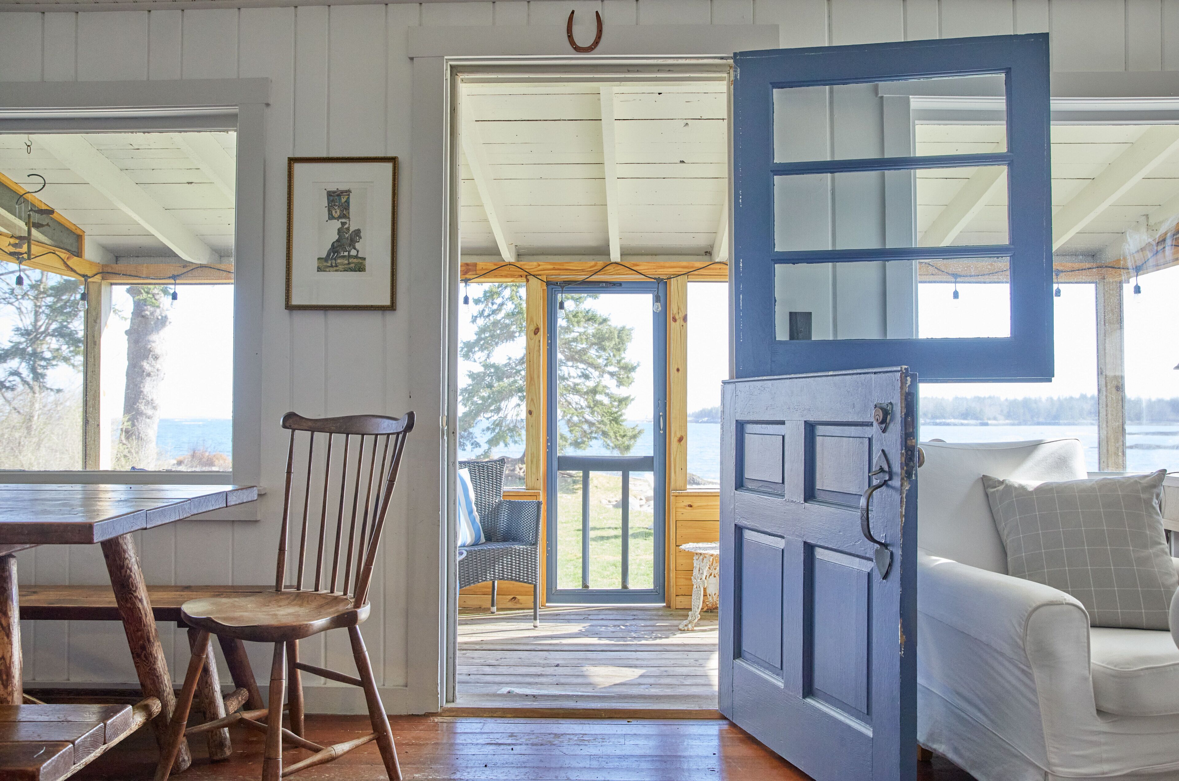 Dutch Doorway leading out to the screened-in porch and the lawn by the ocean
