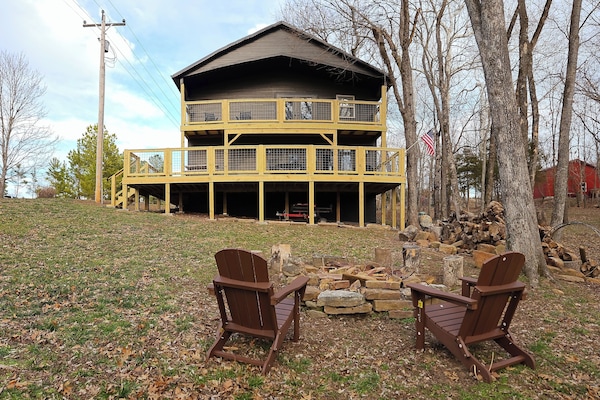 New exterior paint combined with this all-new deck gives this cabin personality!
