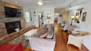 Flat-screen TV, fireplace, foosball