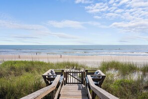 On the beach, sun-loungers