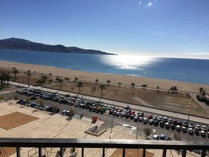 On the beach, sun-loungers