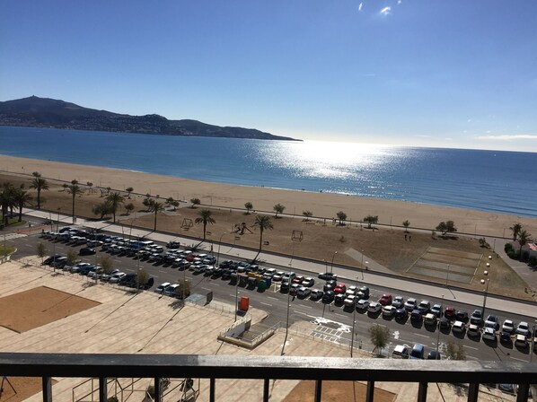 On the beach, sun-loungers