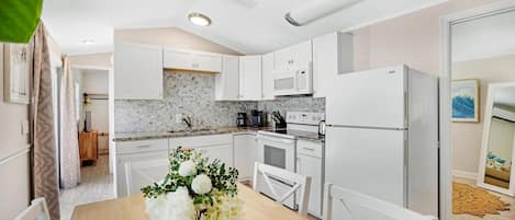 Fridge, microwave, dining tables