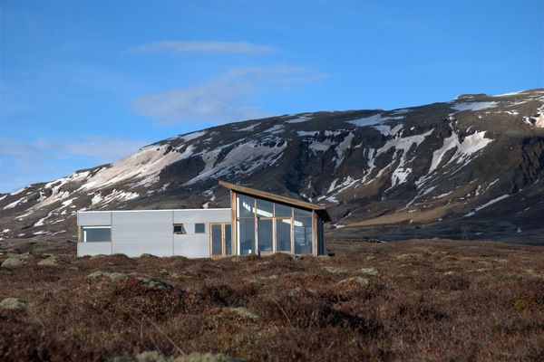 Bjarkaras with the mountain Burfell in the background