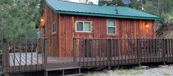 Mountain-side Cabin with hot tub! Close To Town And Skiing on 1.1 acres.