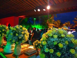 Outdoor banquet area - Excellent seaside house with pool, swim up bar and mine football field (Pilar)