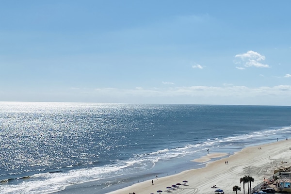 On the beach, beach towels