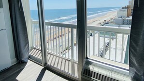 A balcony with a view of the beach and ocean. - Daytona Beach 12th Floor Oceanview With Spectacular Views (Daytona Beach)