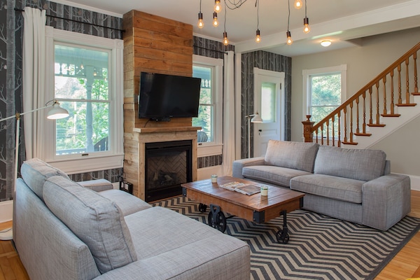 living room with fireplace and gorgeous custom details