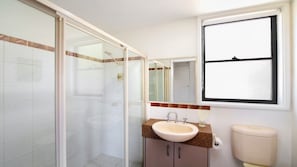 Shower, hair dryer, towels