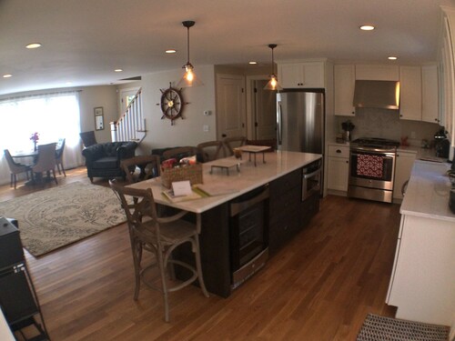 Located Steps Away To Main Street And .7 Miles From Surf Drive Beach