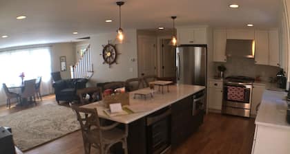 Located Steps Away To Main Street And .7 Miles From Surf Drive Beach