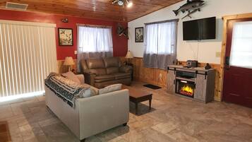 Télévision, lecteur de DVD, livres, vidéothÚque