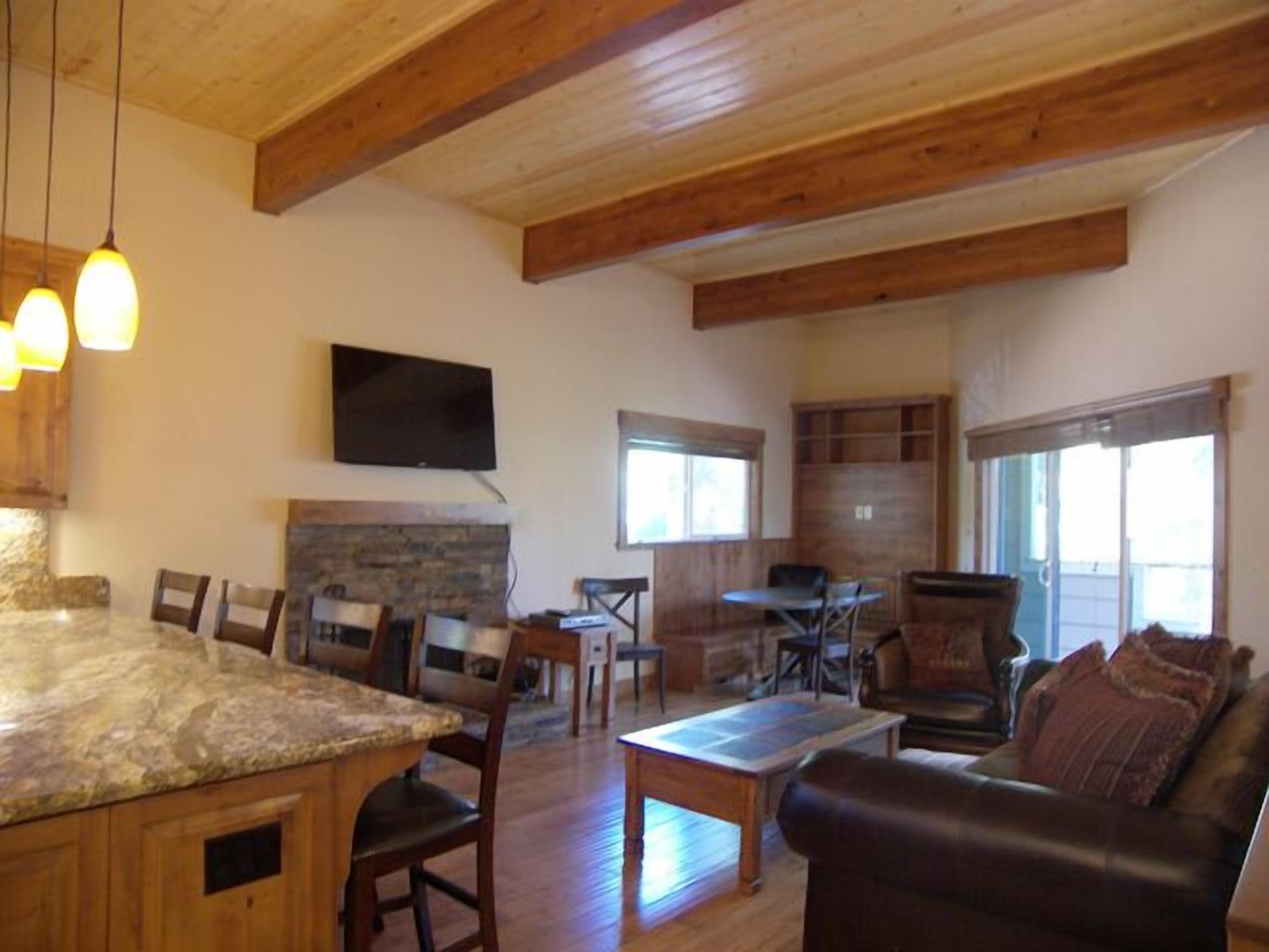 4BR 2.5BA Condo Wood Fireplace Exposed Beams Custom Hardwood Flooring