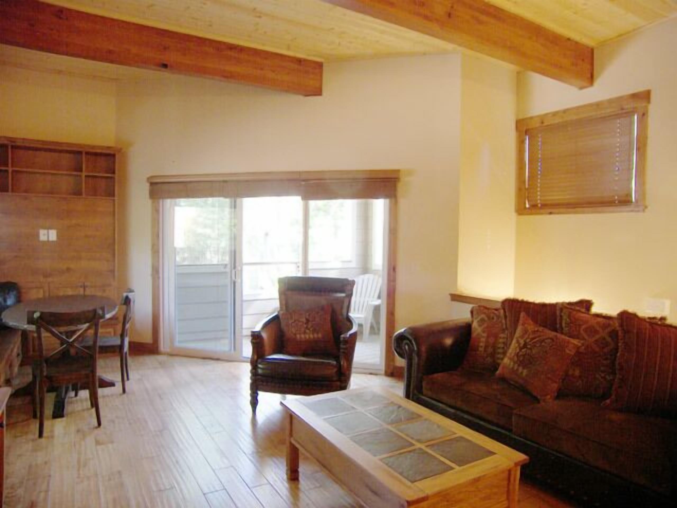 4BR 2.5BA Condo Wood Fireplace Exposed Beams Custom Hardwood Flooring