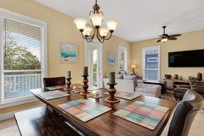 Flat-screen TV, DVD player, books