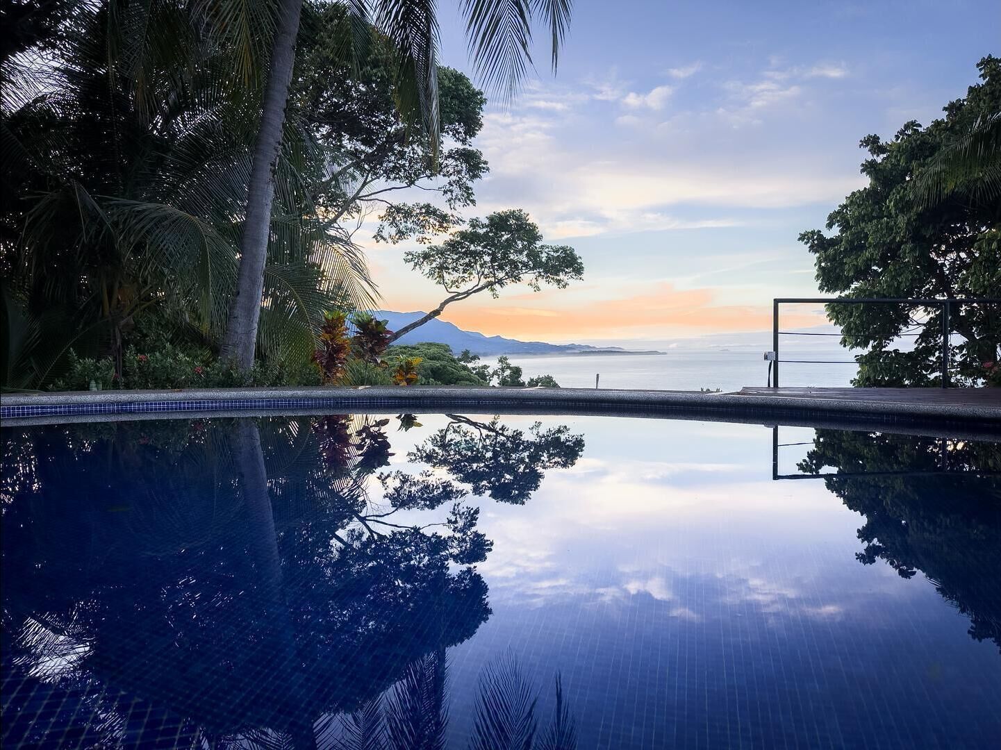 Enjoy the infinity of a sea and sky from your private pool.