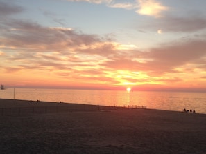 On the beach, sun-loungers