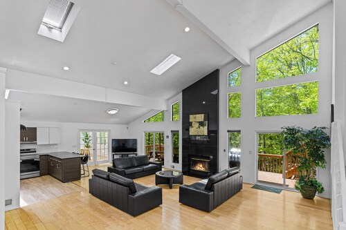 Modern Stream-front property with hot tub.