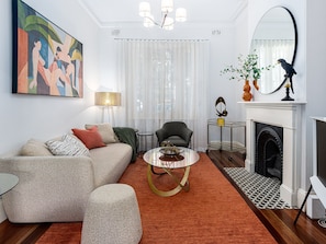 Flat-screen TV, fireplace, DVD player