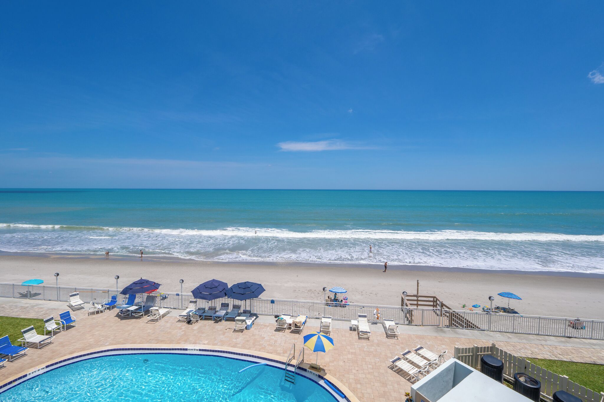 On the beach, sun-loungers, beach towels