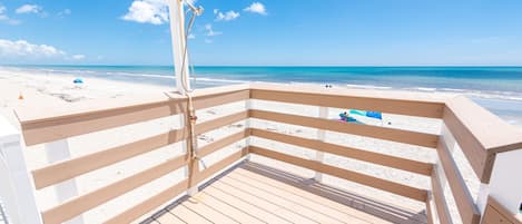 On the beach, sun loungers, beach towels