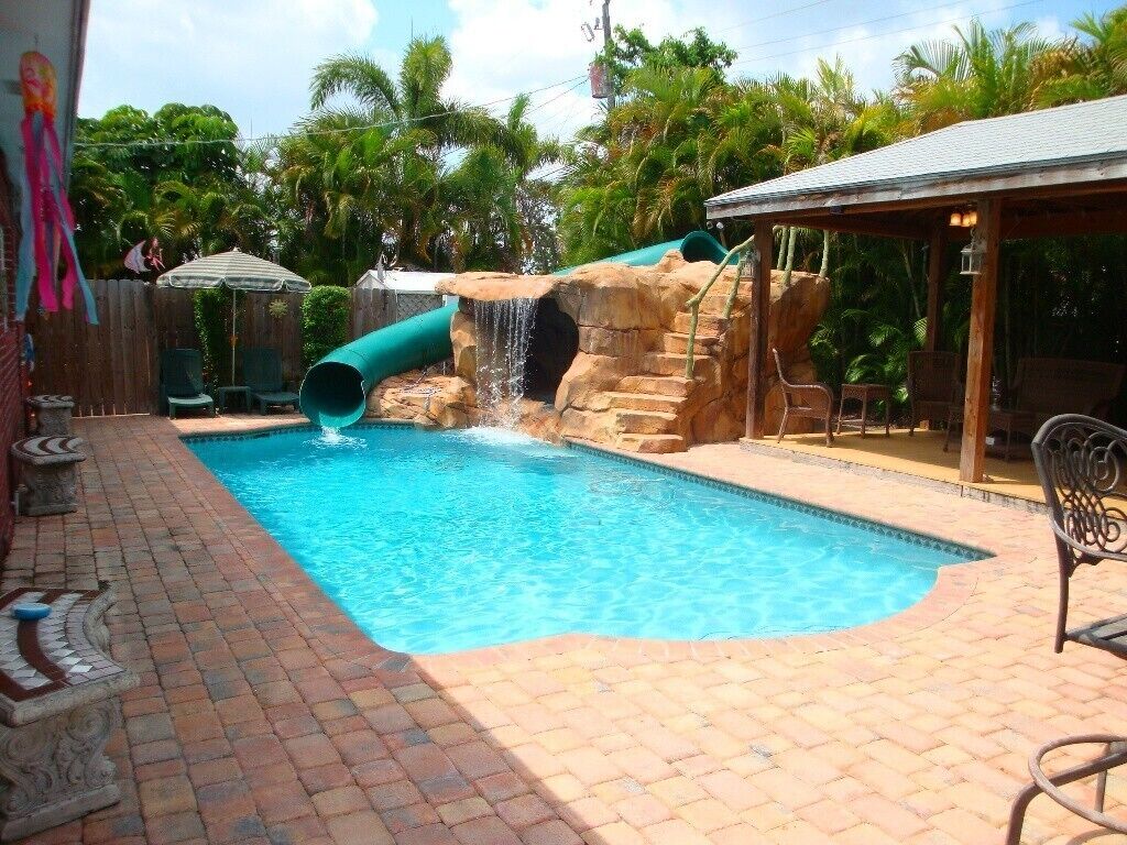 Beautiful Tropical Pool Home with Your Own Private Water Park and Pavillion