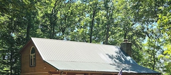 Lake Cumberland custom log cabin home on 32 wooded acres