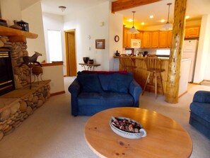 Living Room with loveseat that converts to a twin bed