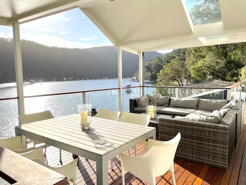 Waterfront modern property w/ boat, outside hot tub, SUPs, kayaks, fishing equip