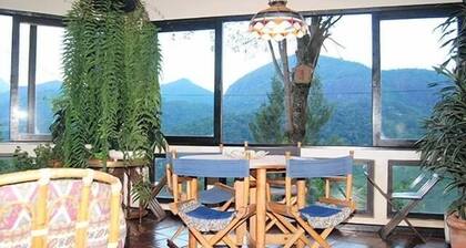Cozy house, beautiful view, ideal for families and couples. OI FIBER INTERNET.