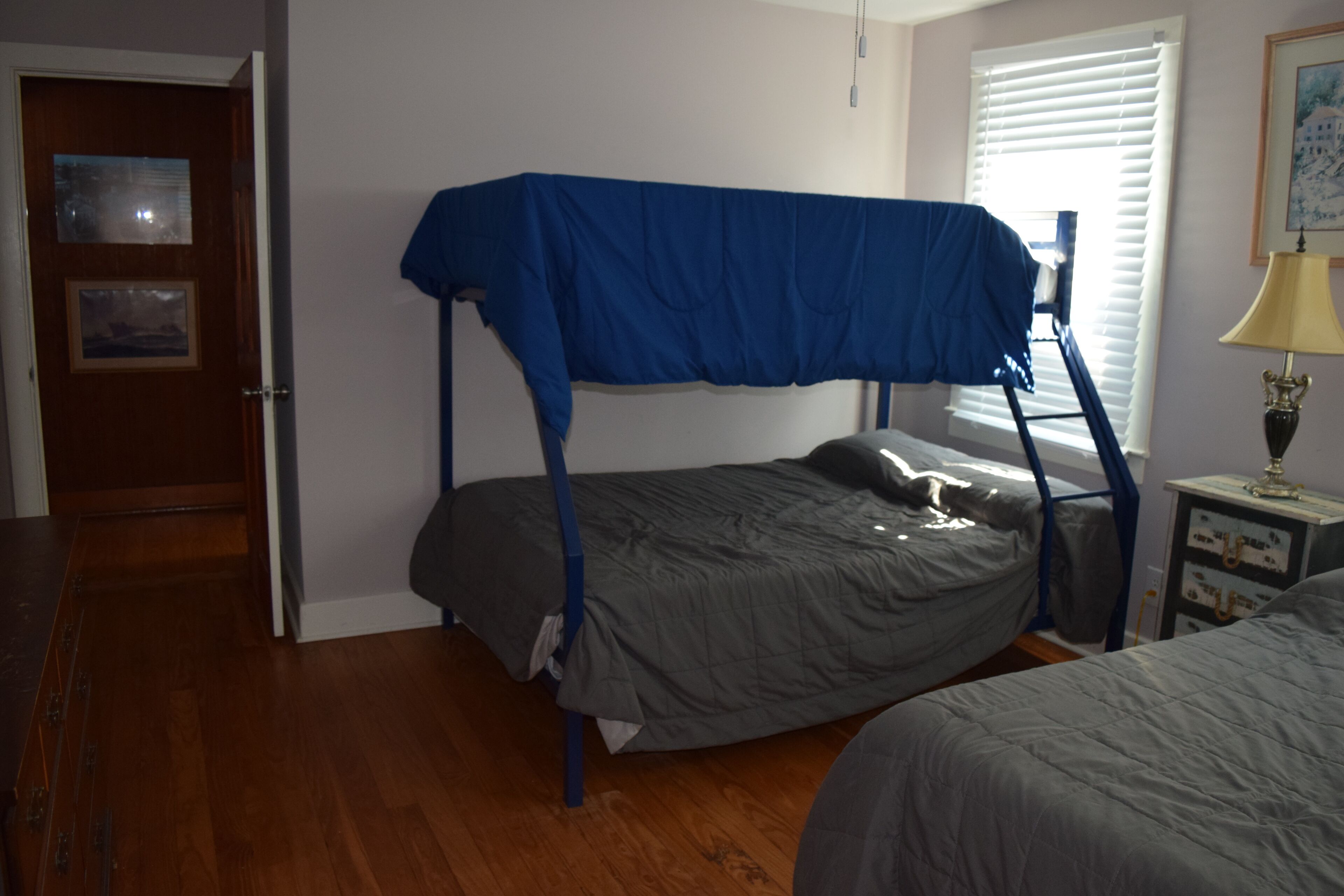 Bedroom two: 2 double beds and twin bunk bed