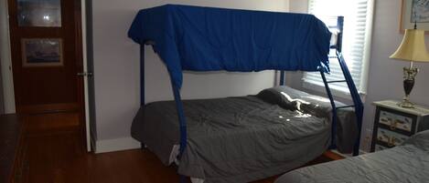 Bedroom two: 2 double beds and twin bunk bed