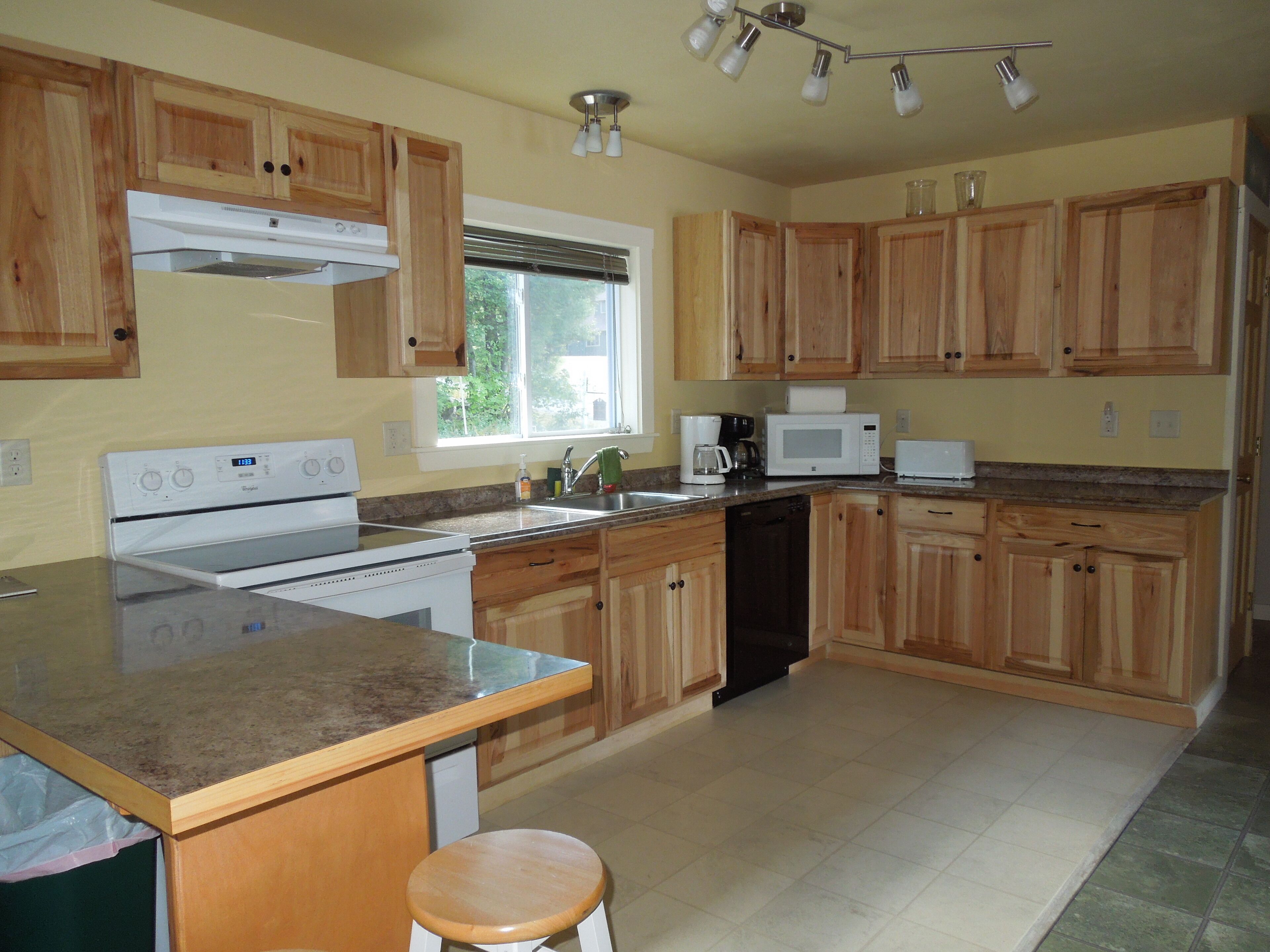 Winter, Spring, Summer, or Fall this Worthley Pond Cottage has it all.