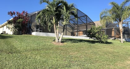 Vue sur l'eau - Piscine et spa - Ă 5 km de Disney - WiFi - TV / Netflix - BBQ