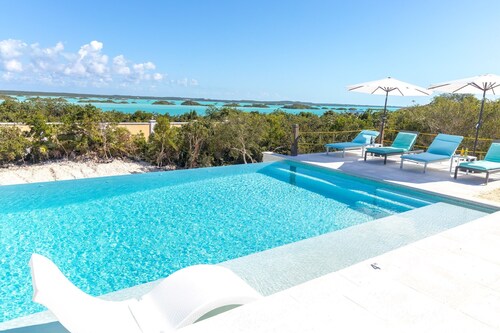 Escape to Exhale at a modern style villa with breathtaking views of chalk sound