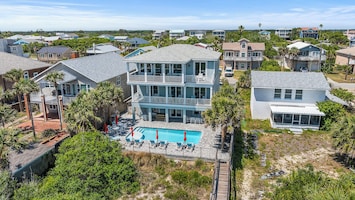 This 3 story oceanfront pool home is magnificent and has every amenity.