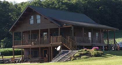 Stunning Log Home on Private Lake- Country at its best