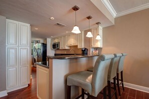 Fridge, microwave, oven, stovetop - A Little Bit of Paradise-Direct Beachfront (Clearwater Beach)