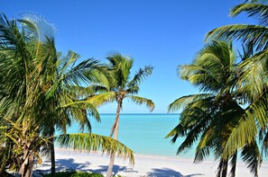 On the beach, sun loungers, beach towels