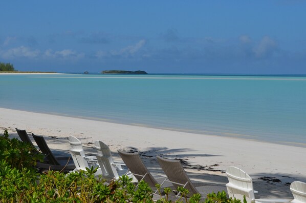 On the beach, sun loungers, beach towels