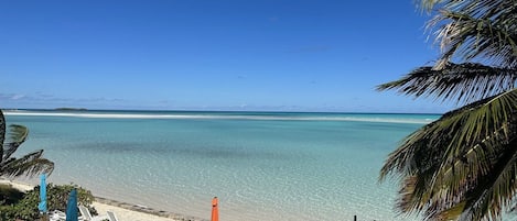On the beach, sun loungers, beach towels