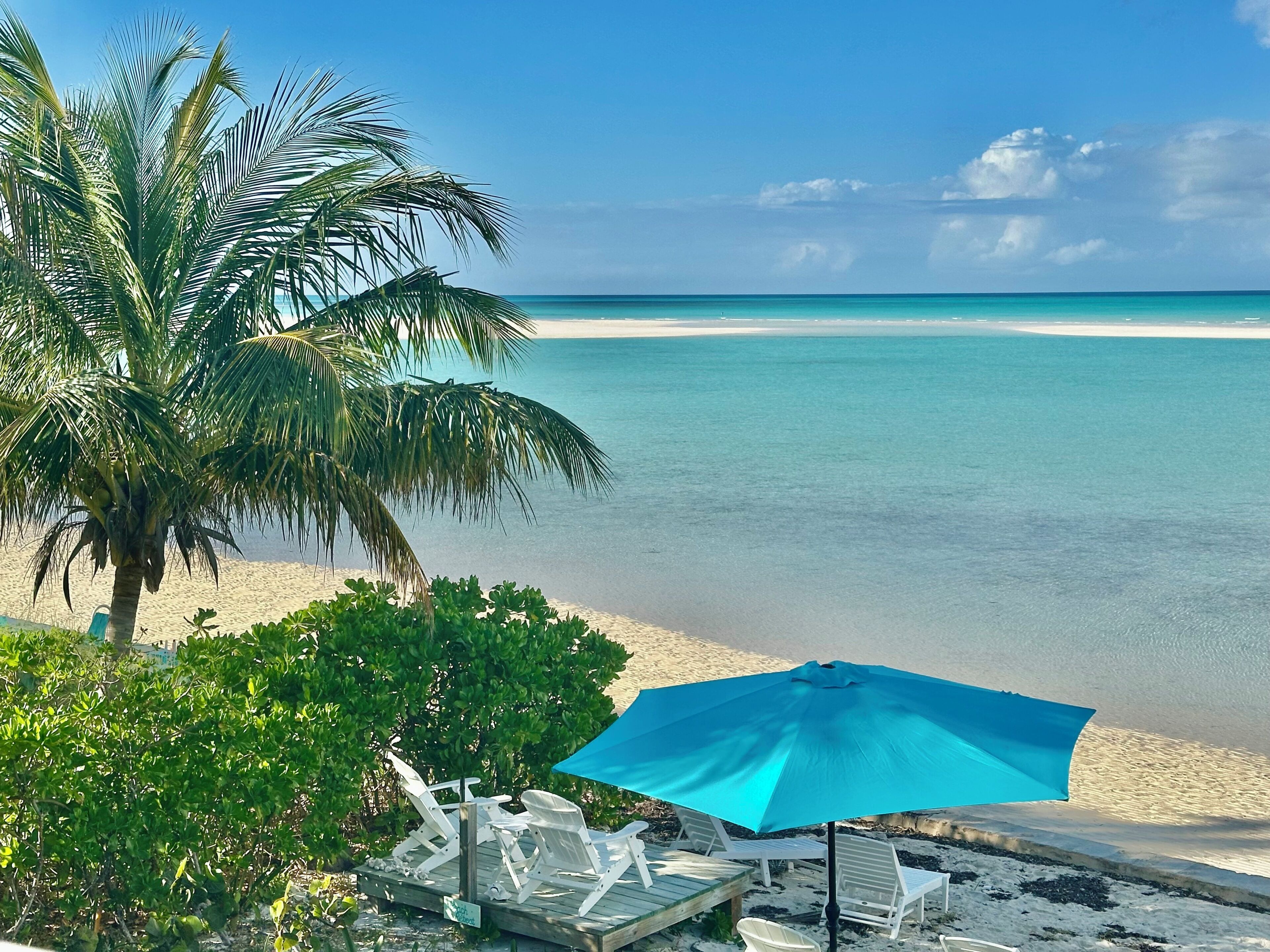 On the beach, sun loungers, beach towels