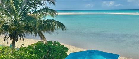On the beach, sun loungers, beach towels