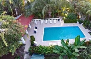 Outdoor pool, open 8:00 AM to 8:30 AM, pool loungers
